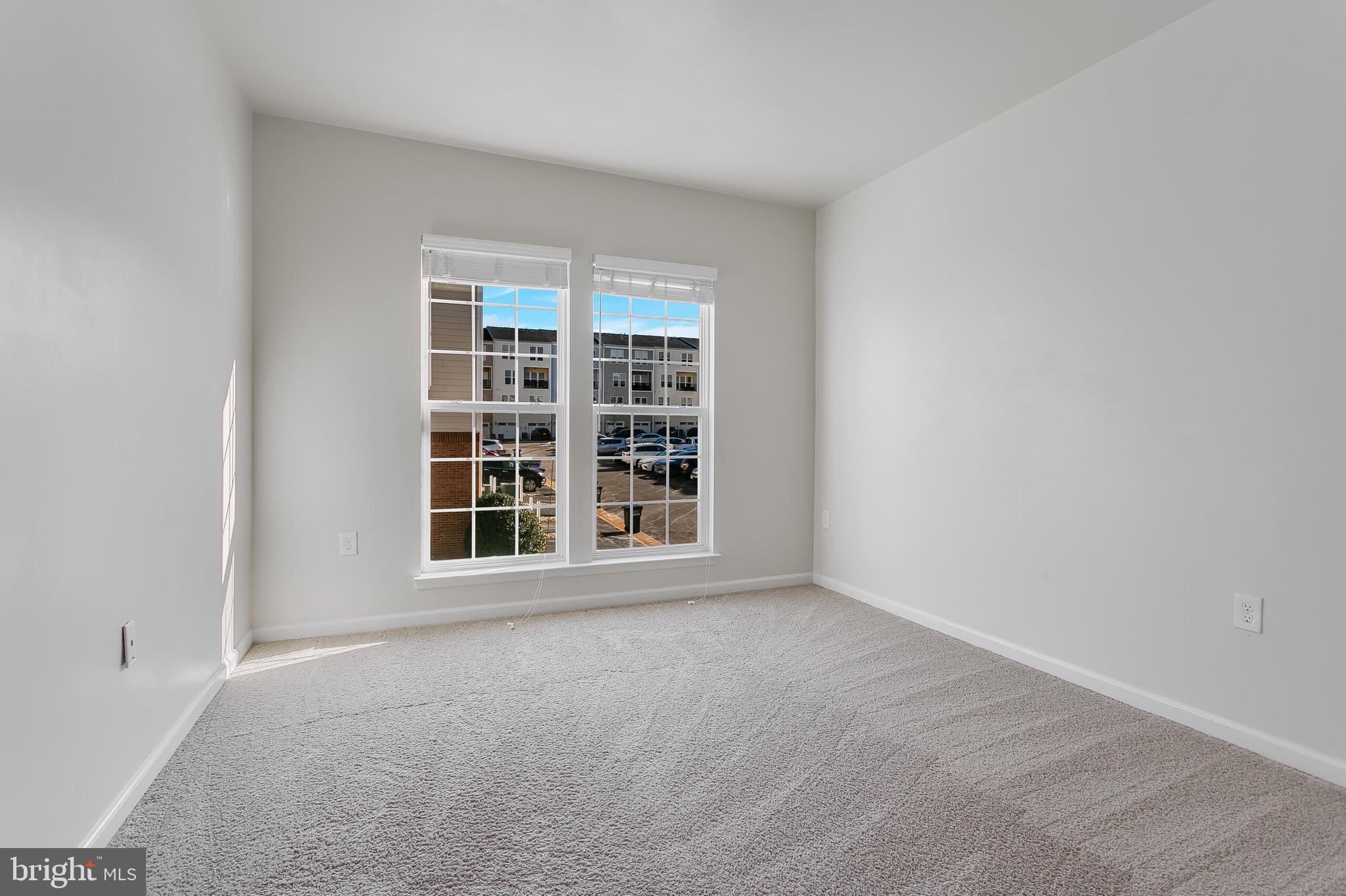 20586 Maitland Terrace Ashburn, VA 20147 - Photo 19 of 24 a view of an empty room with a window
