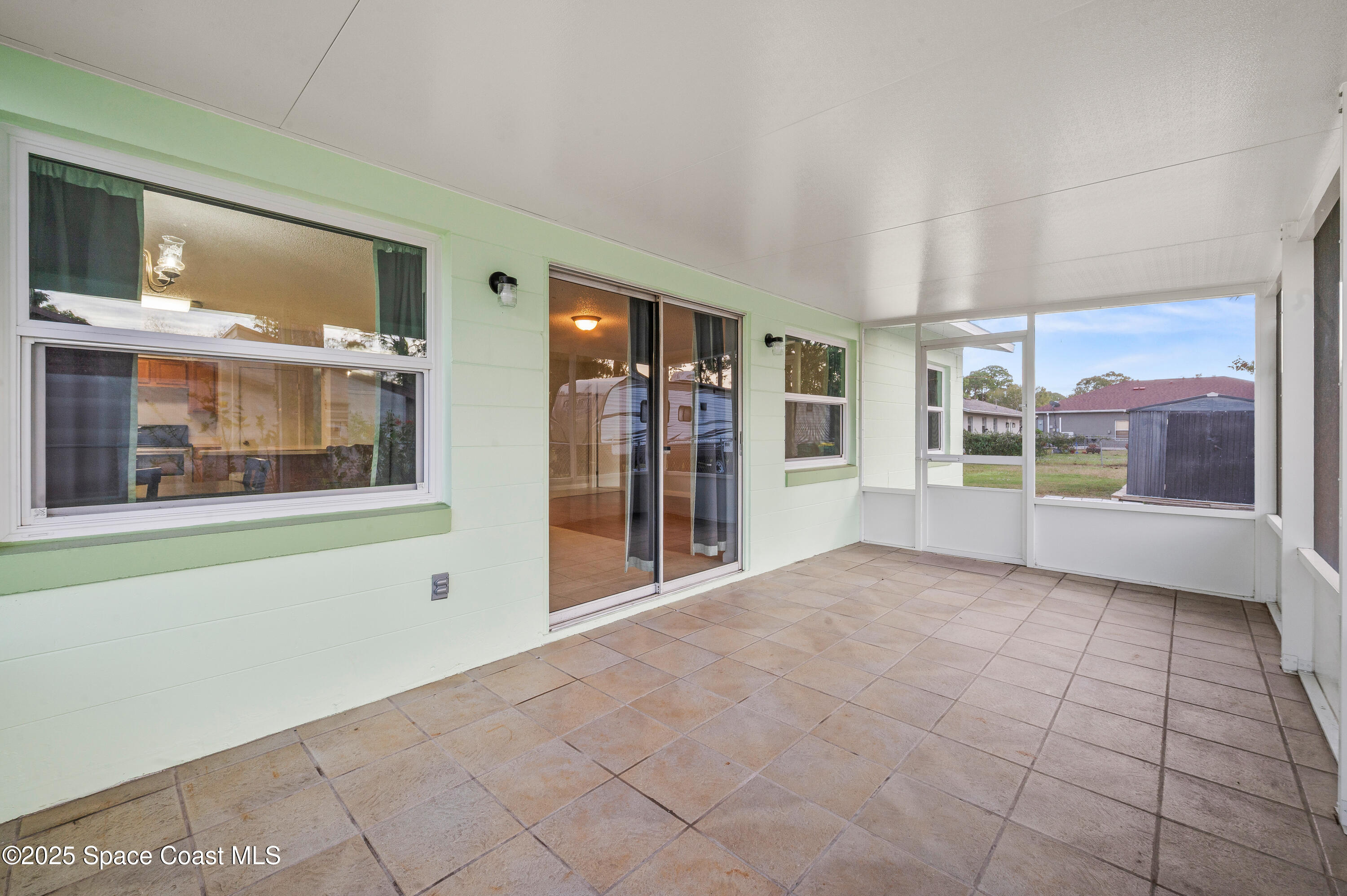 6450 Ember Avenue Cocoa, FL 32927 - Photo 30 of 40 a view of an empty room with a window
