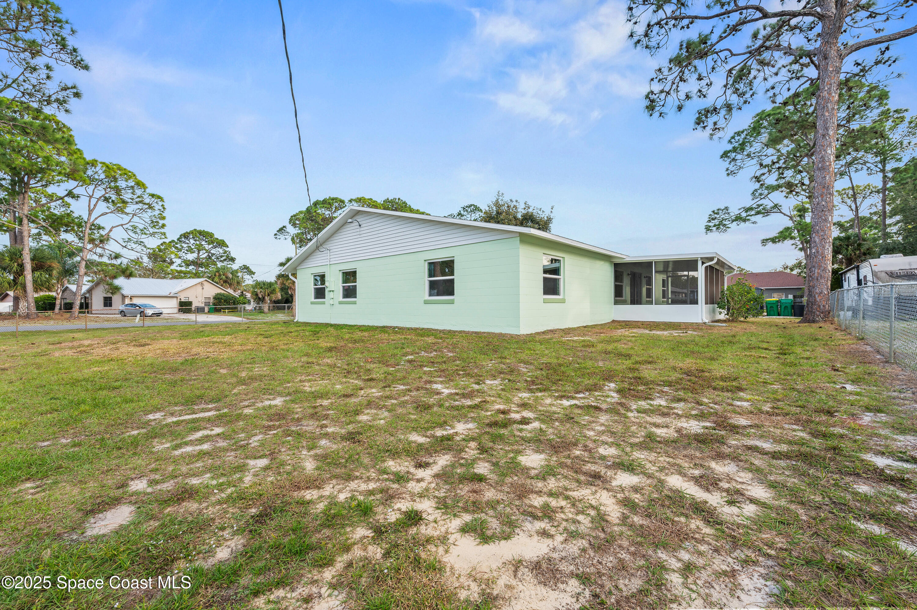 6450 Ember Avenue Cocoa, FL 32927 - Photo 35 of 40 a house view with a garden space