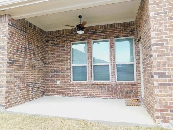 a house view with a outdoor space