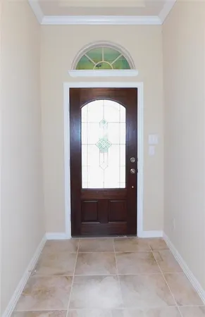 a view of front door with a vanity