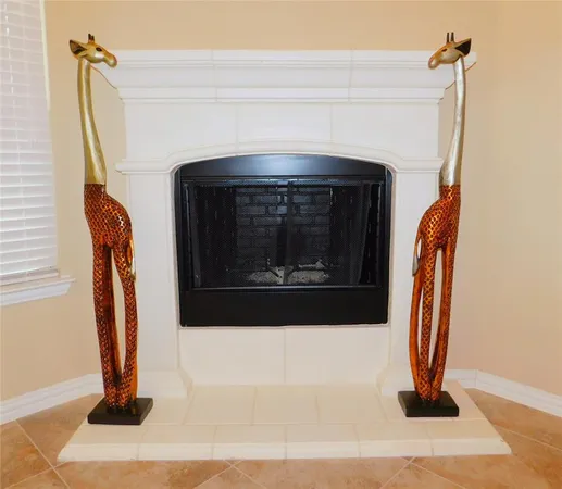 a view of living room with a fireplace