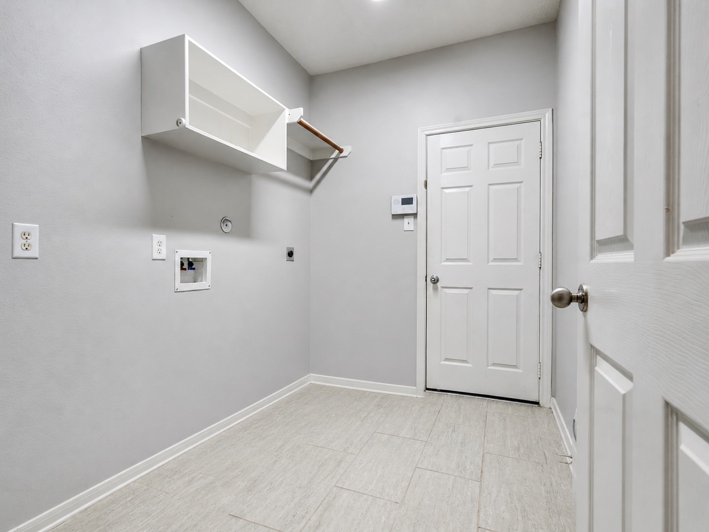 2615 Fern Lacy Drive Spring, TX 77388 - Photo 20 of 32 The utility room is conveniently located at the front of the house leading to the 2 car garage.