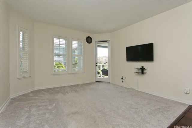 a kitchen with stainless steel appliances granite countertop a sink and a stove