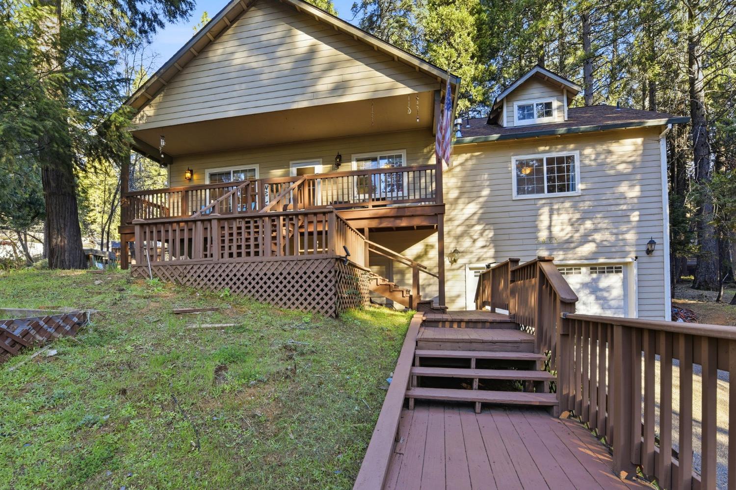 2845 Viona Road Pollock Pines, CA 95726 - Photo 1 of 35 a view of a house with backyard and wooden fence