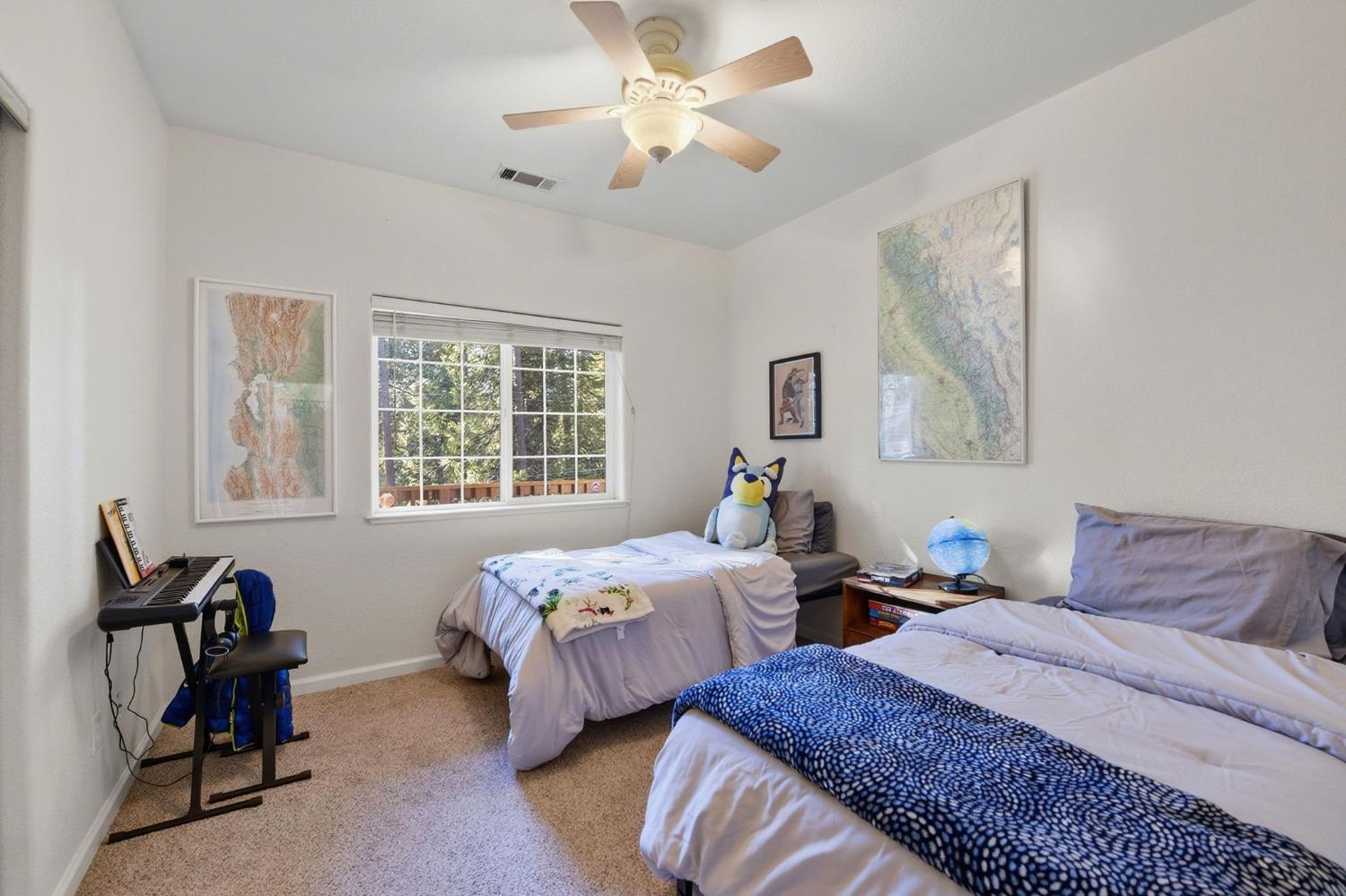 2845 Viona Road Pollock Pines, CA 95726 - Photo 21 of 35 a bedroom with two beds and a window