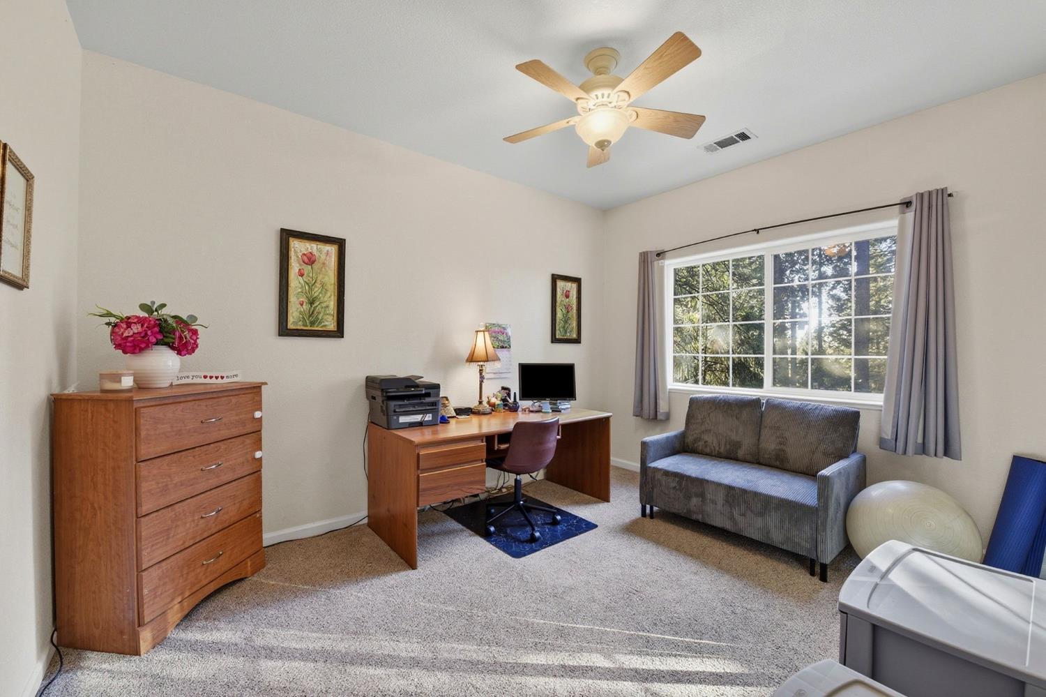 2845 Viona Road Pollock Pines, CA 95726 - Photo 21 of 32 a living room with furniture and a large window