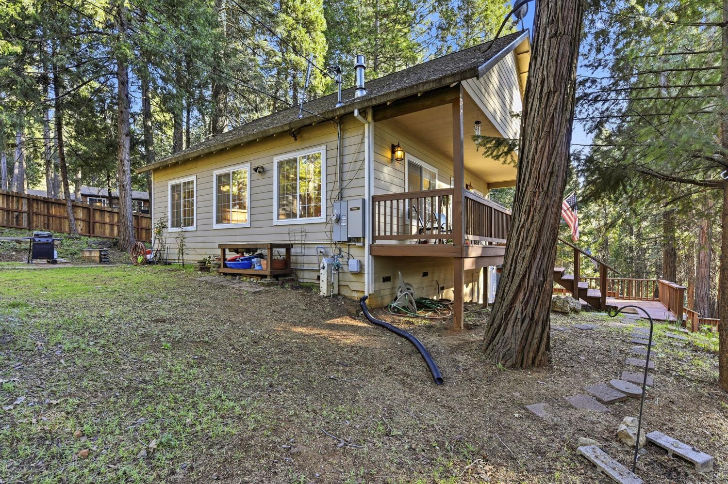 2845 Viona Road Pollock Pines, CA 95726 - Photo 26 of 32 a view of a house with backyard and sitting area