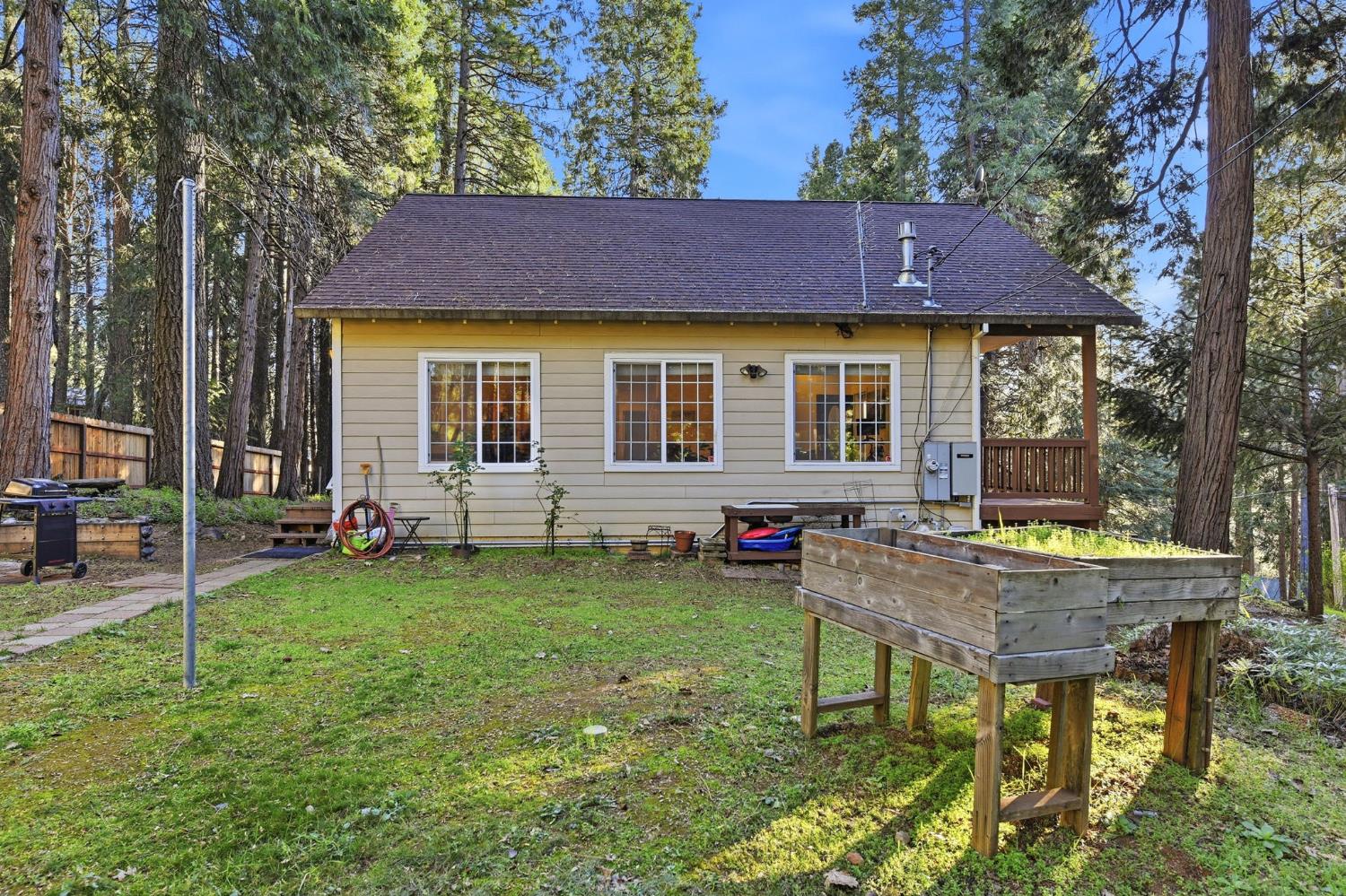 2845 Viona Road Pollock Pines, CA 95726 - Photo 28 of 32 a view of a house with backyard and sitting area