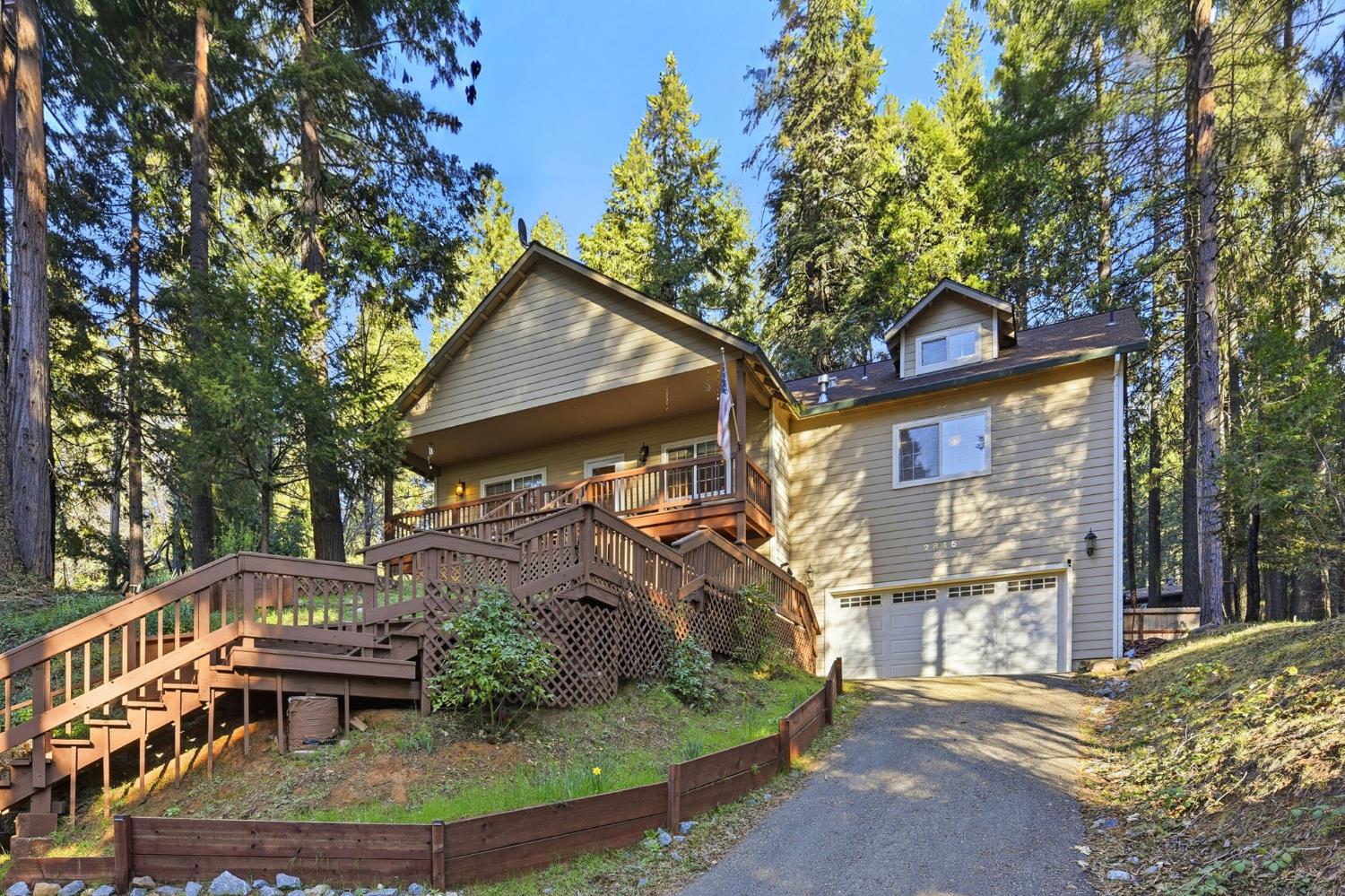 2845 Viona Road Pollock Pines, CA 95726 - Photo 28 of 35 a front view of a house with garden