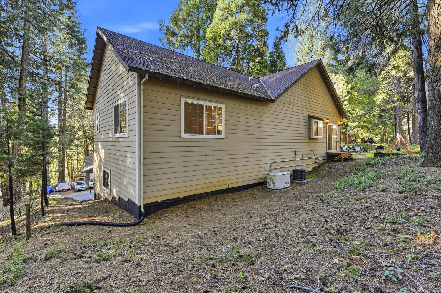 2845 Viona Road Pollock Pines, CA 95726 - Photo 29 of 35 a view of a house with a yard and garage