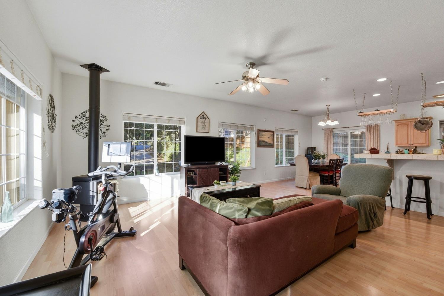 2845 Viona Road Pollock Pines, CA 95726 - Photo 7 of 35 a living room with furniture kitchen view and a large window