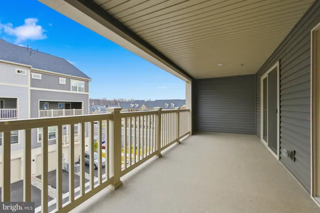 a view of a car parked in front of a building