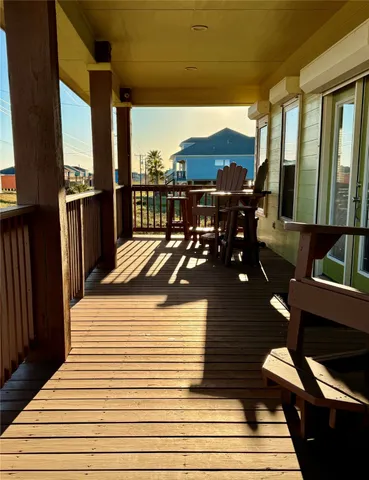 a kitchen with stainless steel appliances granite countertop a refrigerator a stove top oven a sink and dishwasher