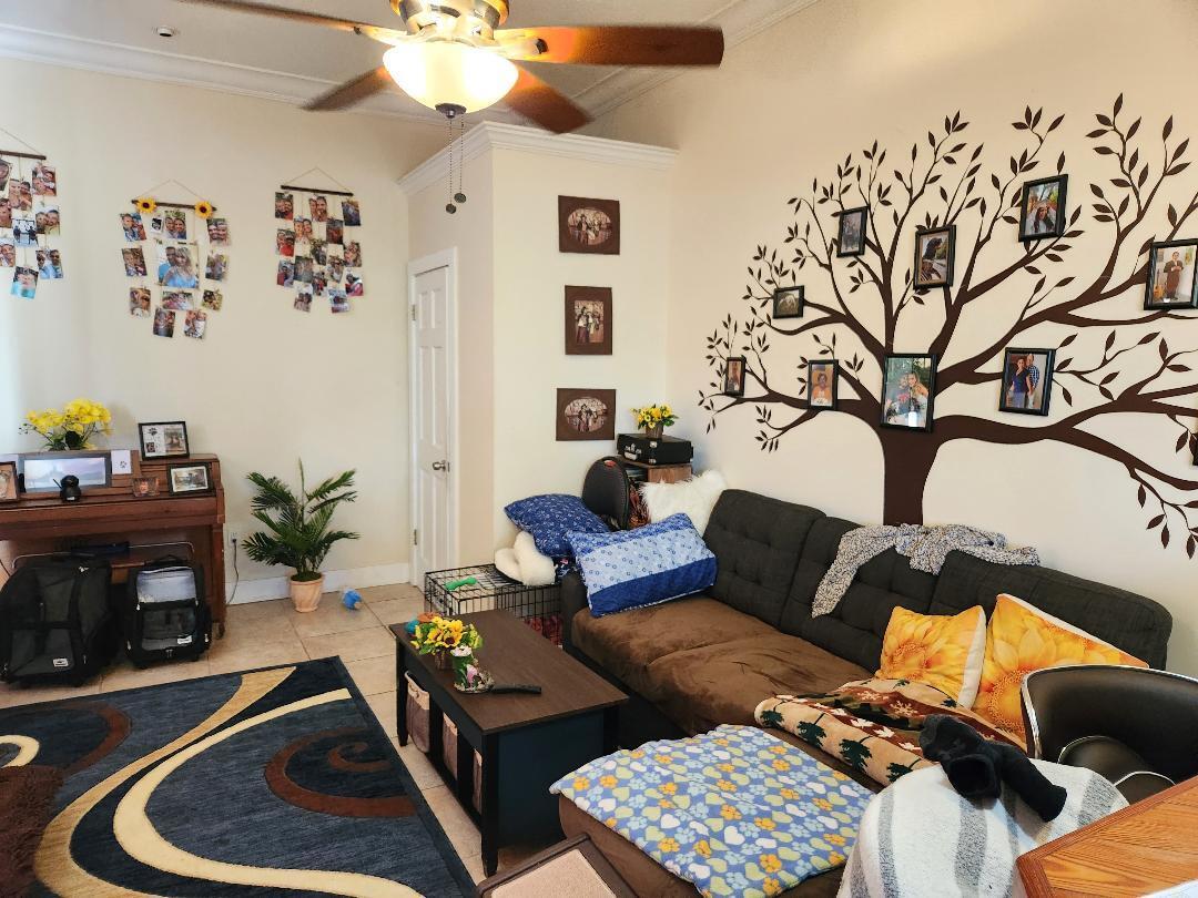 2210 Staples Avenue Key West, FL 33040 - Photo 19 of 33 a living room with furniture and a fireplace