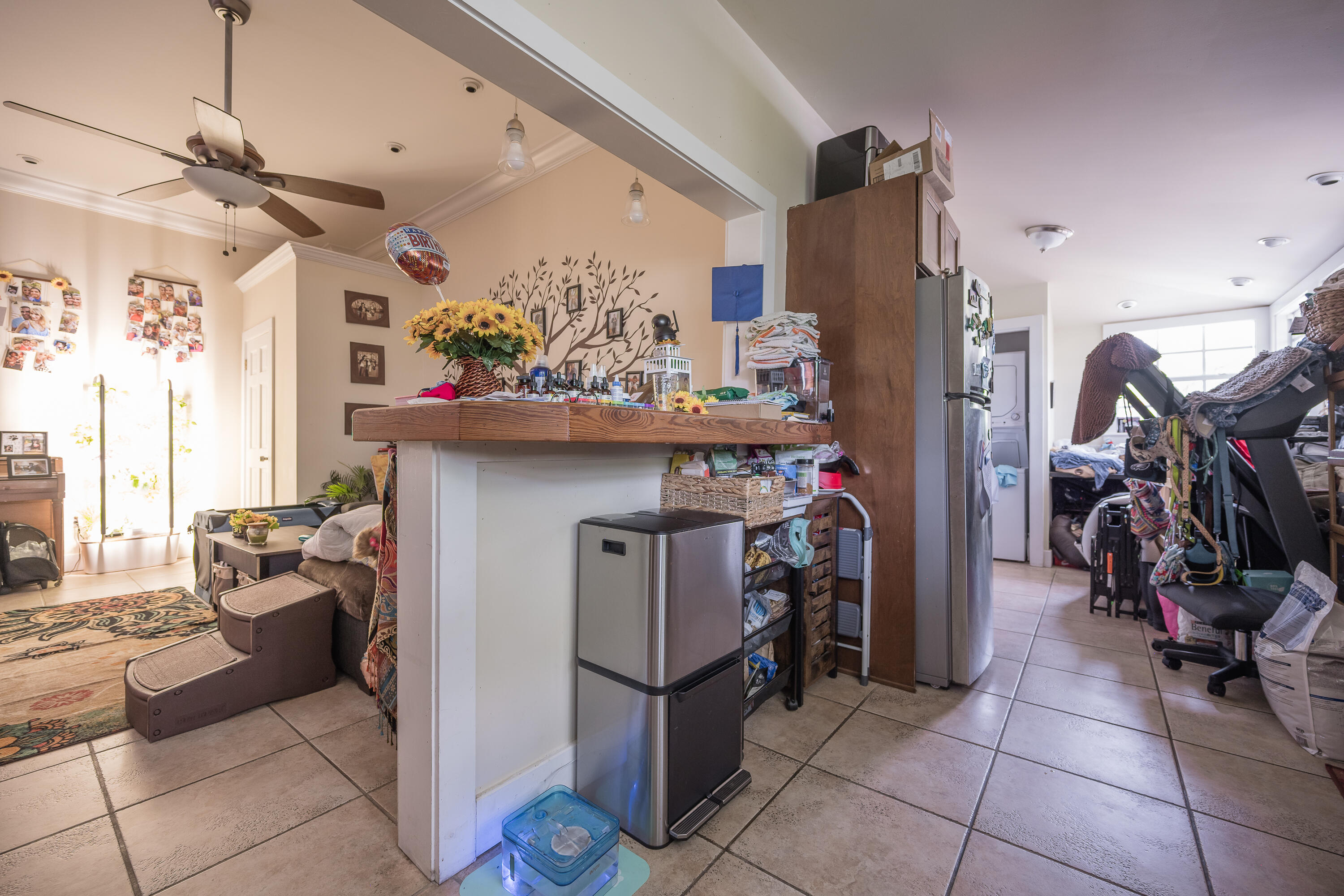 2210 Staples Avenue Key West, FL 33040 - Photo 23 of 33 a kitchen with stainless steel appliances granite countertop a refrigerator and a sink