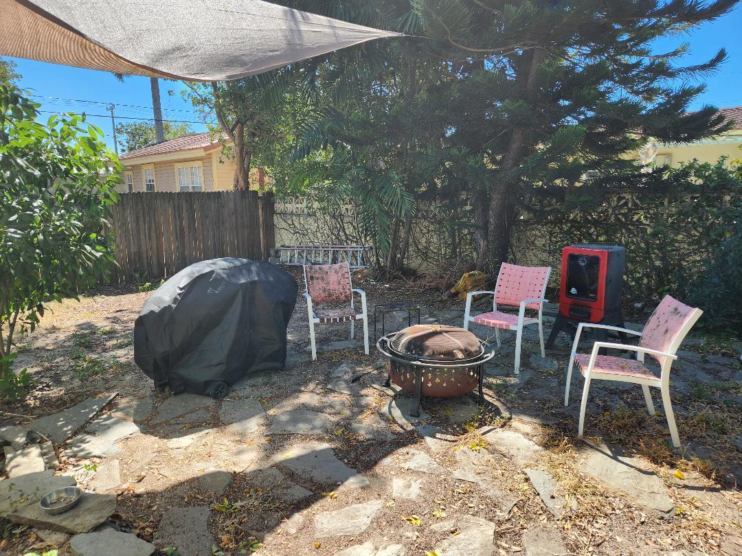 2210 Staples Avenue Key West, FL 33040 - Photo 5 of 33 a view of a chairs and table in backyard