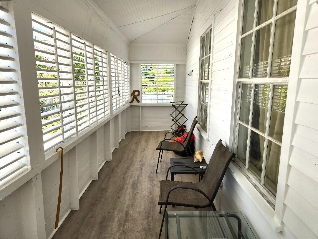 2210 Staples Avenue Key West, FL 33040 - Photo 6 of 33 a living room with furniture and a window