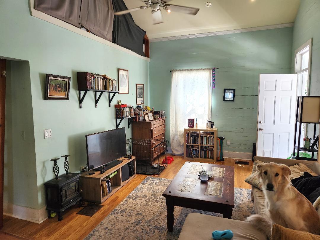 2210 Staples Avenue Key West, FL 33040 - Photo 8 of 33 a living room with furniture and a flat screen tv