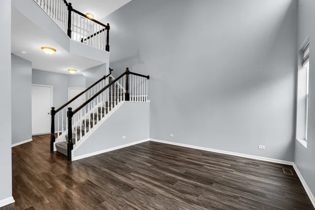 a view of entryway with wooden floor