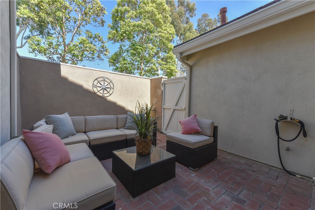 55 Wellesley, Unit 55 Irvine, CA 92612 - Photo 2 of 11 a view of a couches in a patio