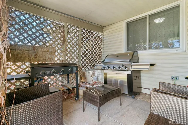 a stove top oven sitting inside of a kitchen