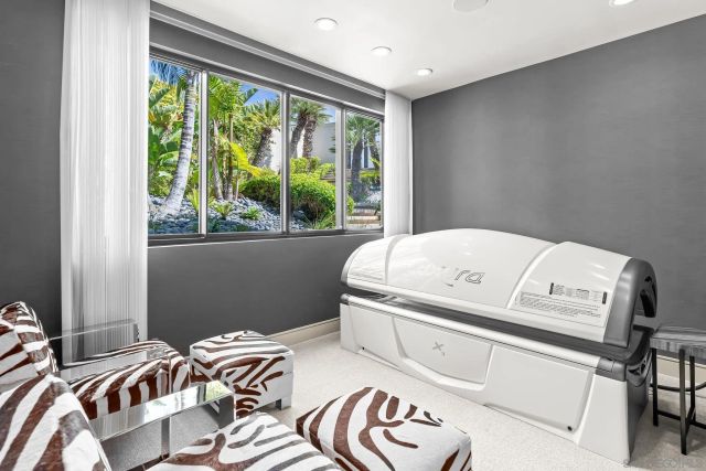 a view of a garden with chairs