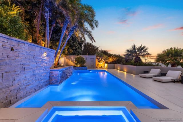 a view of backyard with potted plants