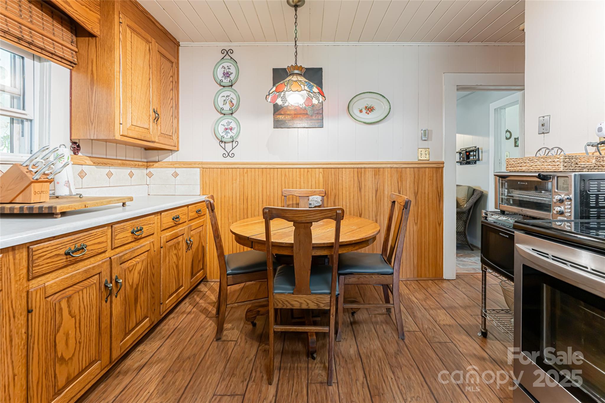 338 Morgan Road Candler, NC 28715 - Photo 13 of 42 a view of a dining room with furniture window and wooden floor