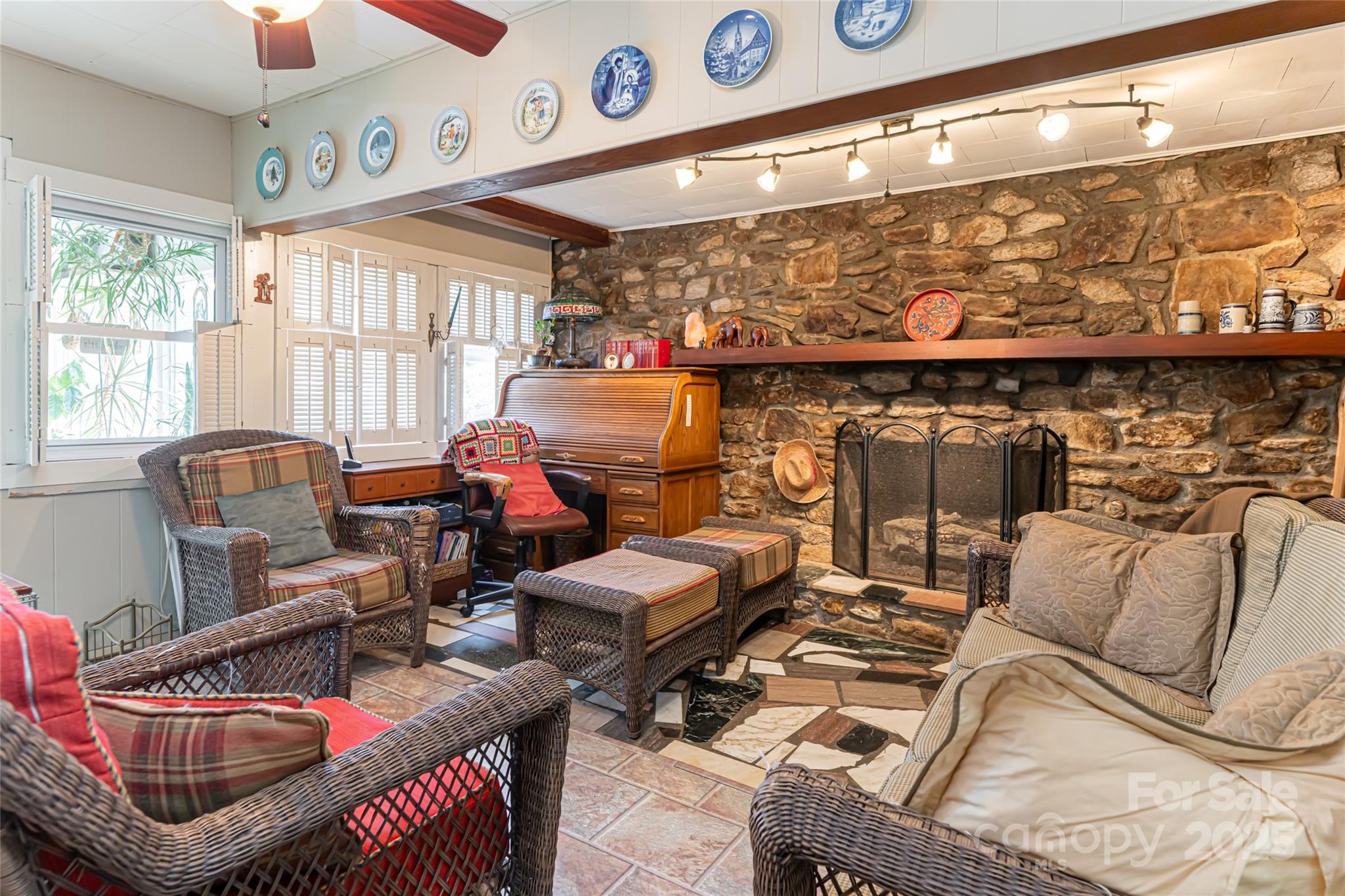 338 Morgan Road Candler, NC 28715 - Photo 17 of 42 a living room with furniture a rug and a window