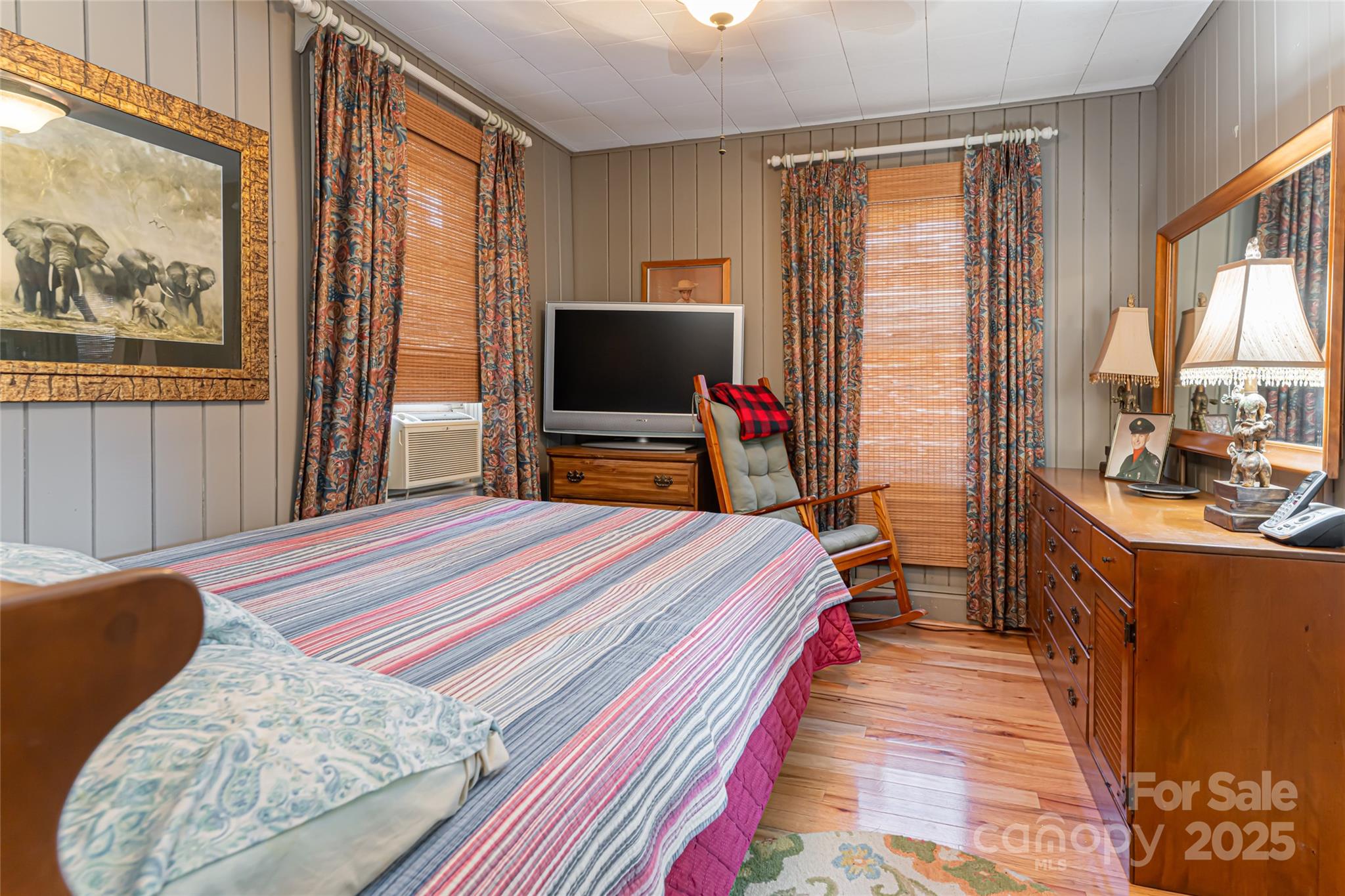 338 Morgan Road Candler, NC 28715 - Photo 24 of 42 a room with a bed and a flat screen tv