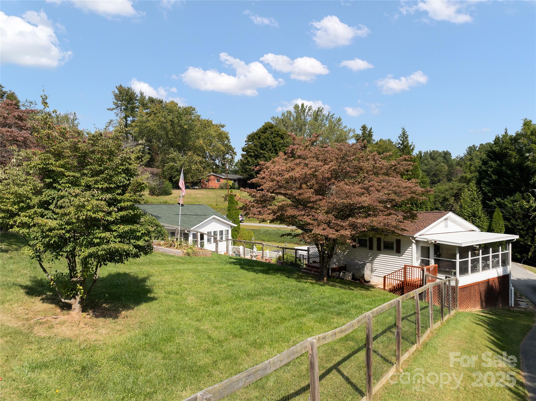 338 Morgan Road Candler, NC 28715 - Photo 38 of 42 a view of a house with a big yard