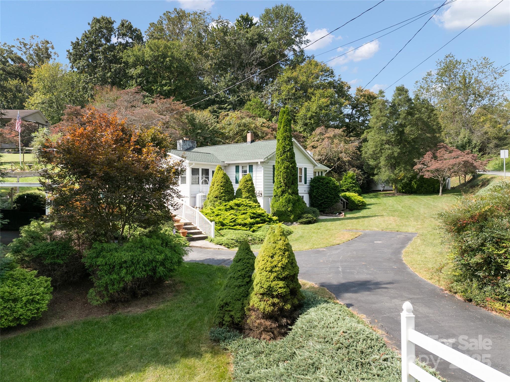 338 Morgan Road Candler, NC 28715 - Photo 41 of 42 a view of a garden with pathway