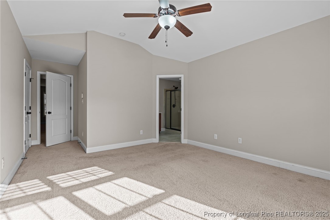 419 Rolling Pines Drive Spring Lake, NC 28390 - Photo 13 of 31 a view of a chandelier fan and entryway