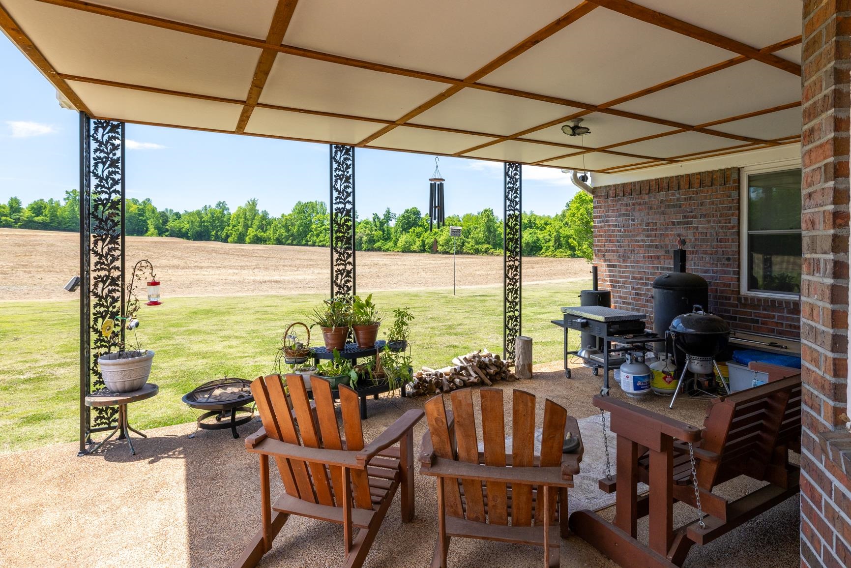 8539 Campground Road Drummonds, TN 38023 - Photo 35 of 38 a view of an outdoor sitting area with furniture