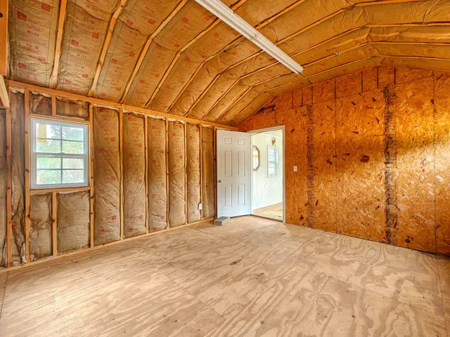 a view of a room with a window