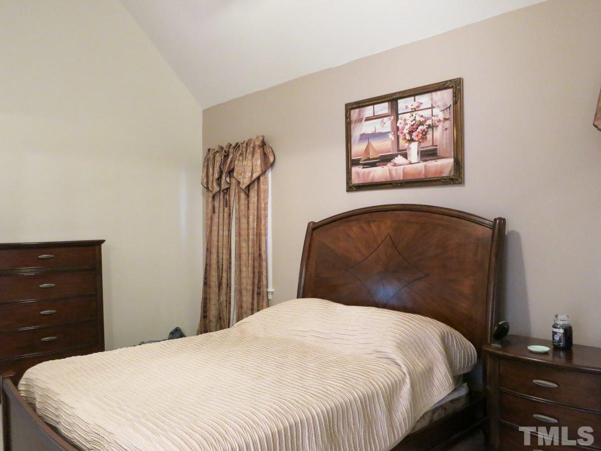 2845 Praire View Point Wendell, NC 27591 - Photo 13 of 25 Another view of the lg vaulted 1st floor Master Bedroom.