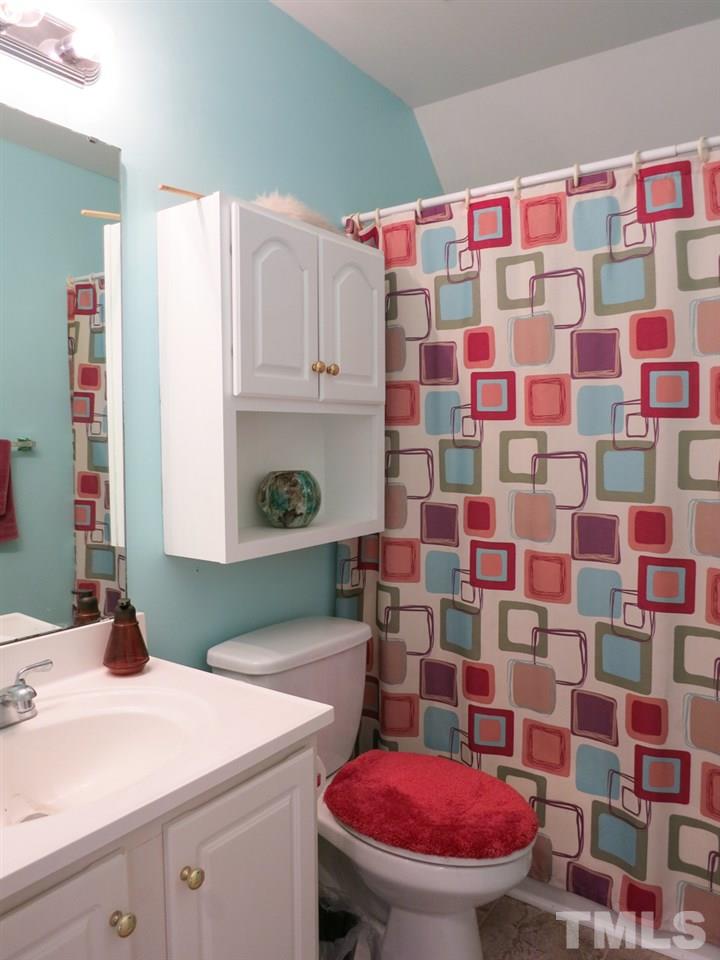 2845 Praire View Point Wendell, NC 27591 - Photo 19 of 25 The Hall Bath features a tub/shower & neutral vinyl floor.