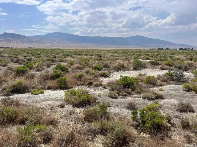 a view of a city with mountain