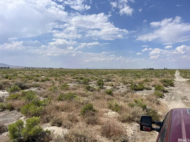 a view of a city and mountains