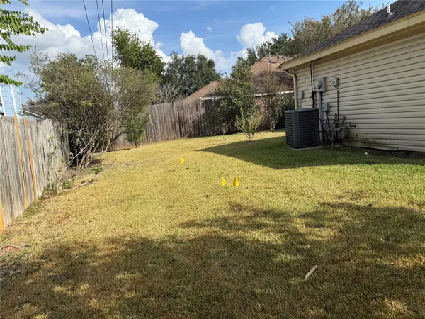a view of backyard of house