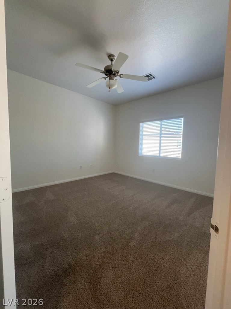4915 East Russell Road, Unit 154 Las Vegas, NV 89120 - Photo 16 of 20 Soft carpeting pairs with a multi-pane window to create a quiet, comfortable space.