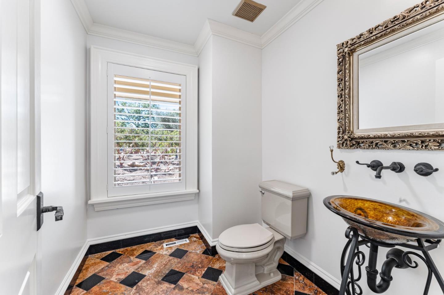 1080 Finley Road Pleasanton, CA 94588 - Photo 11 of 85 a bathroom with a toilet a sink and a mirror