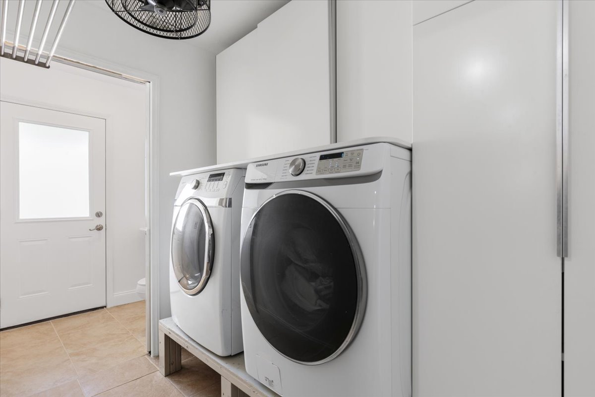 12400 Rusted Nail Cove Austin, TX 78750 - Photo 25 of 31 Conveniently located on the main level, the laundry space is designed for efficiency.
