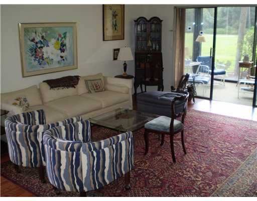7970 Eastlake Drive, Unit 15A Boca Raton, FL 33433 - Photo 6 of 12 a view of a livingroom with furniture window and outside view