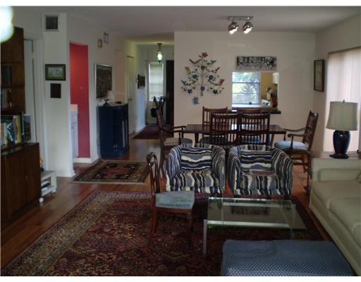 7970 Eastlake Drive, Unit 15A Boca Raton, FL 33433 - Photo 7 of 12 a view of a dining room with furniture