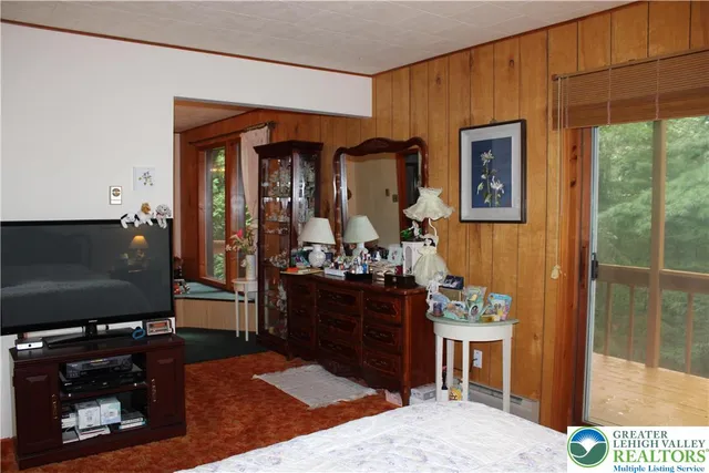 a bathroom with a shower and a sink