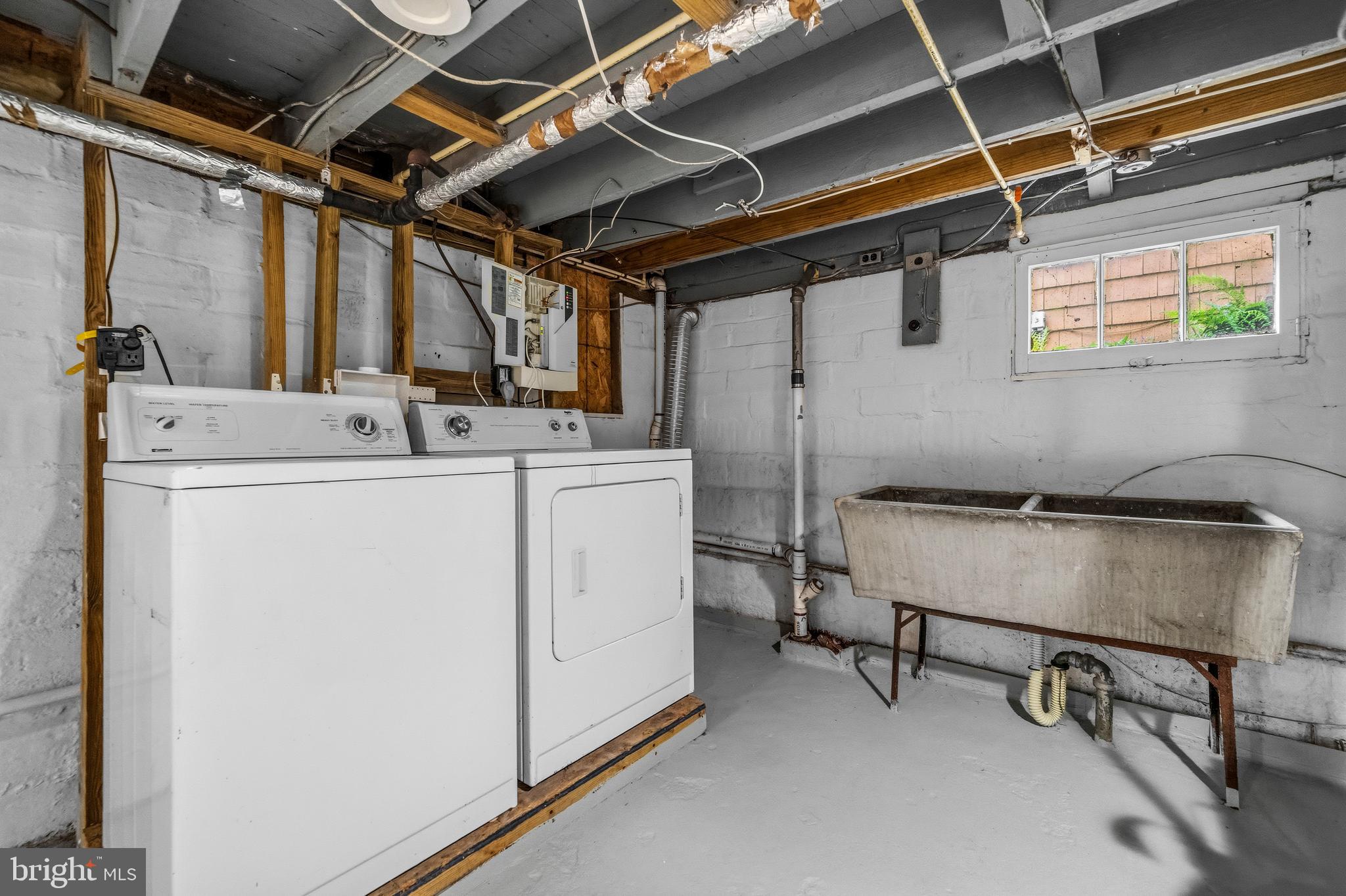 12 Leeway Dundalk, MD 21222 - Photo 29 of 34 a utility room with dryer and washer