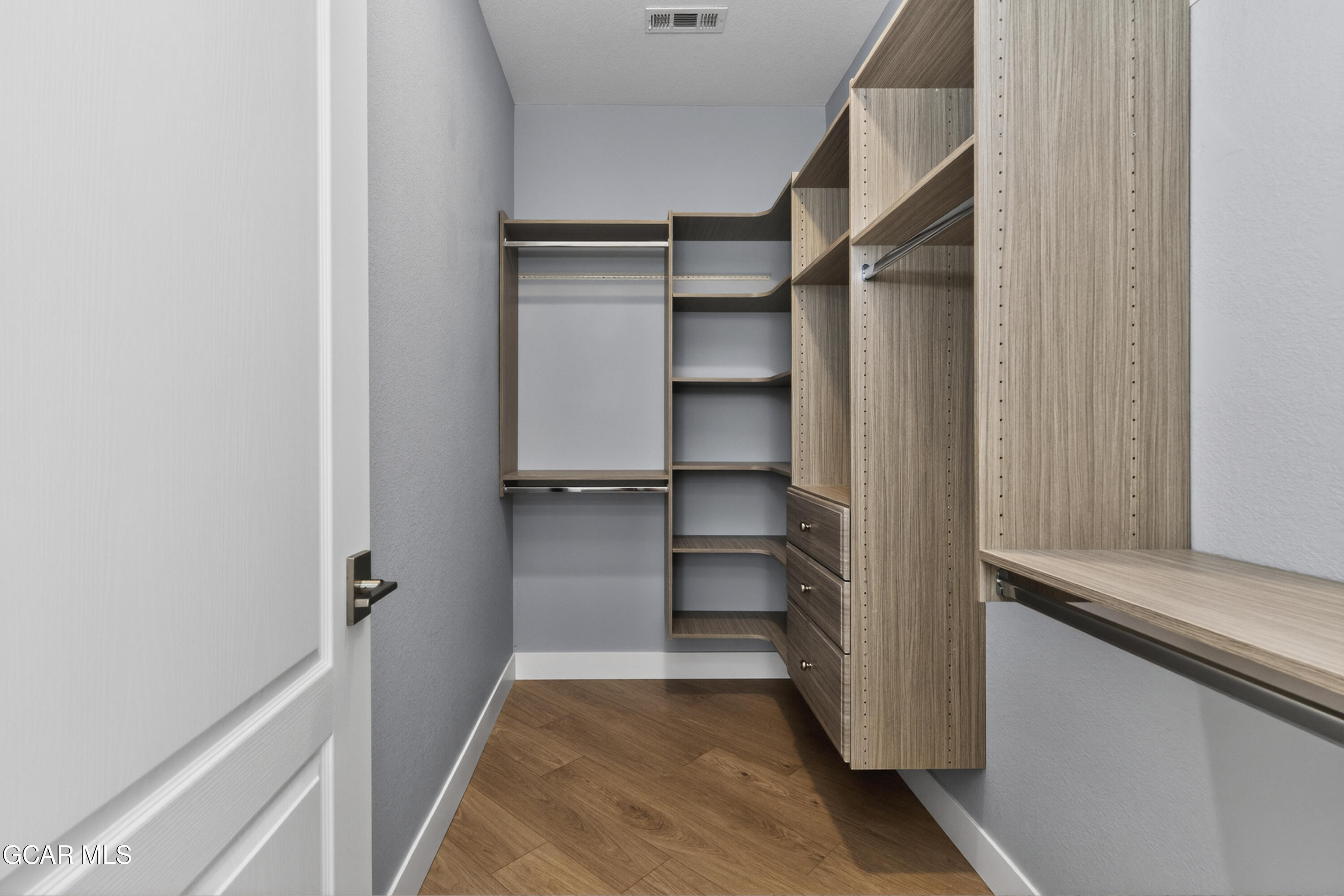 160 Village Road, Unit F207 Granby, CO 80446 - Photo 15 of 28 a view of walk in closet with empty racks