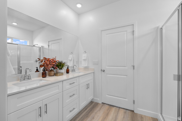 1589 South Fins Road, Unit 4178 Washington, UT 84780 - Photo 27 of 30 Dual vanity with white cabinetry, quartz-finish countertop, and chrome fixtures